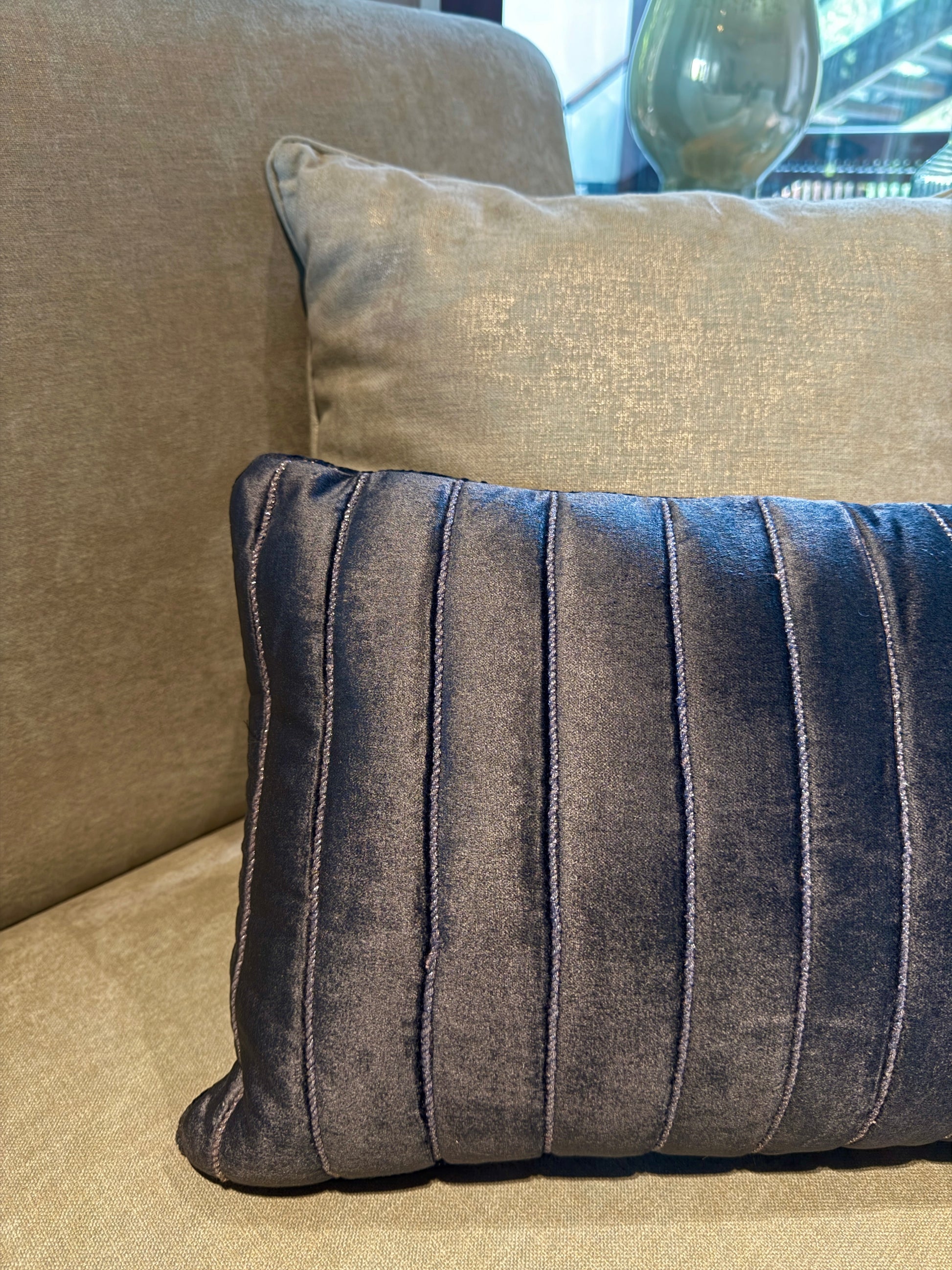  The Noir Velvet Cushion is crafted from ultra-soft velvet in a rich charcoal black, elevated with subtle vertical tufting that adds texture and polish. 