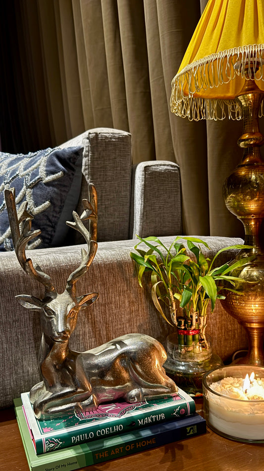 Designed in a sitting posture with intricate detailing and a lustrous silver finish, this sculpture is a tribute to the calm strength of the wild. 