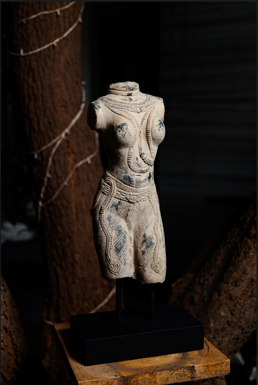 Handcrafted Antique Torso Sculpture Add a captivating piece of art to your home with our Handcrafted Antique Torso Sculpture. This intricate statue, inspired by classical Indian sculpture, showcases a beautifully carved female torso adorned with traditional patterns and detailing. 