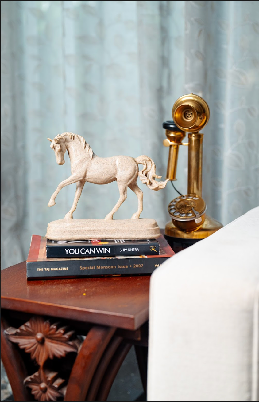 Bring a touch of elegance and timeless beauty to your decor with our Resin Horse on Stand. Capturing the majestic grace of a galloping horse, this meticulously crafted piece adds a sense of movement and vitality to any space. 