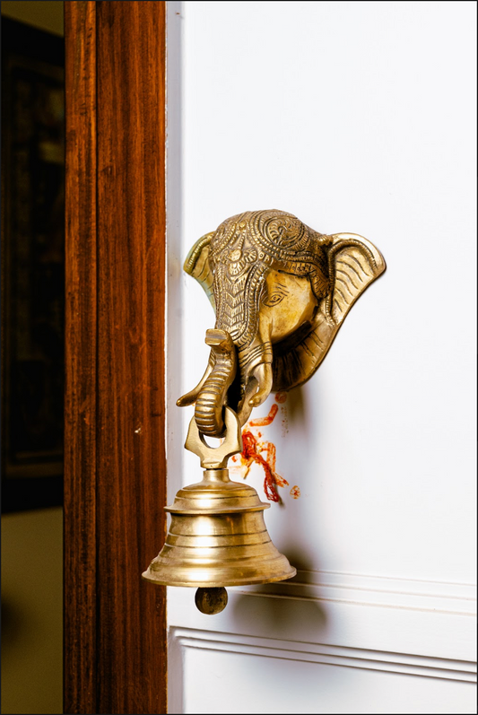 Featuring the serene visage of Lord Ganesha, the remover of obstacles and harbinger of prosperity, this beautifully crafted brass bell serves as both a striking decorative piece and a symbol of devotion. 