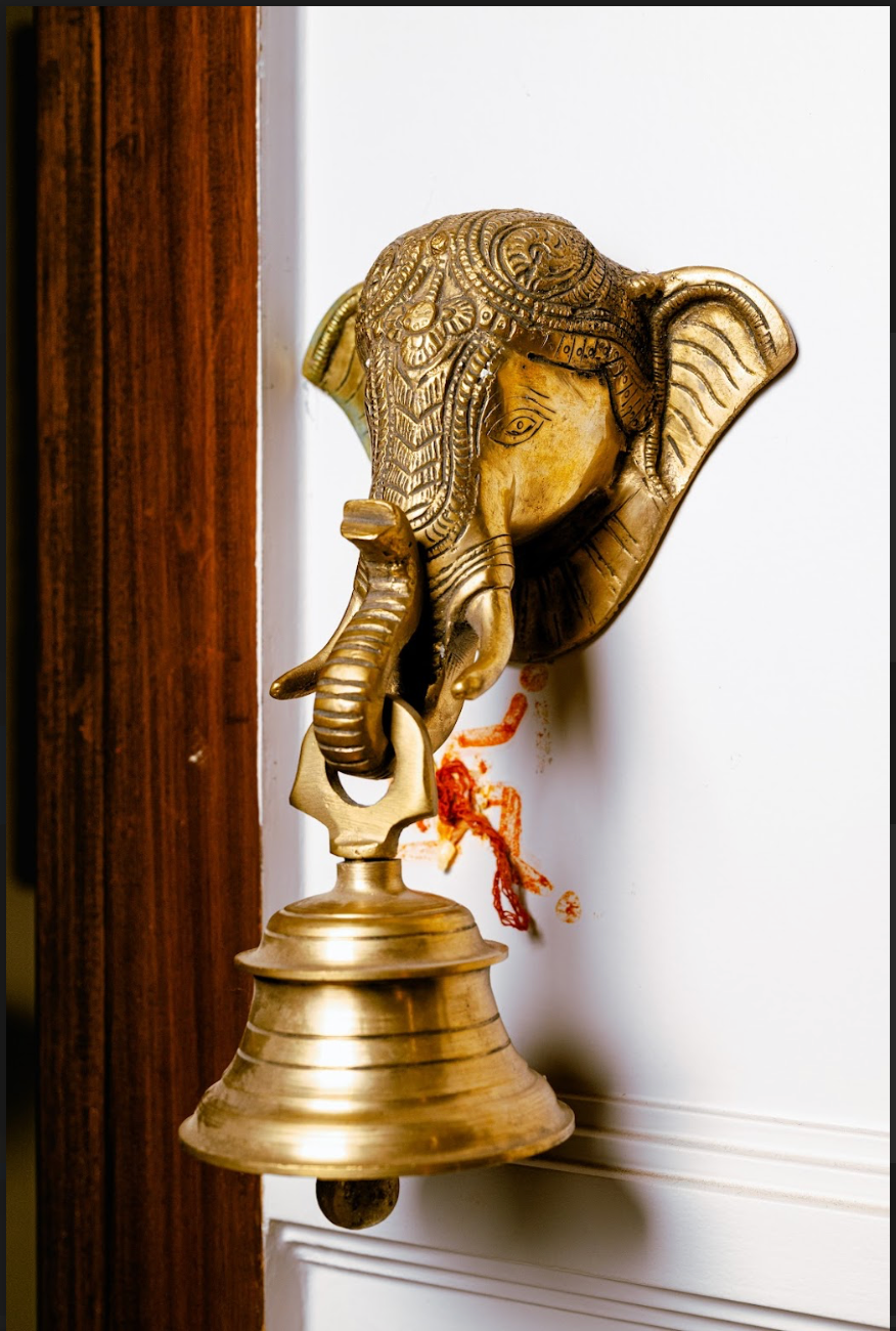 Featuring the serene visage of Lord Ganesha, the remover of obstacles and harbinger of prosperity, this beautifully crafted brass bell serves as both a striking decorative piece and a symbol of devotion. 