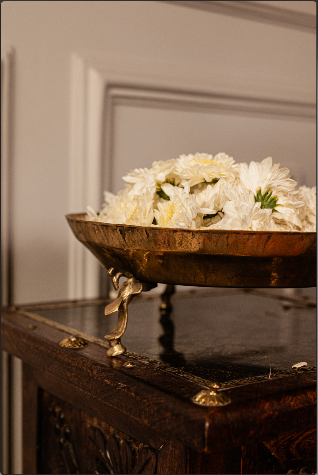 Handcrafted by skilled artisans, this decorative piece features an intricately designed stand that elevates the beauty of its traditional form. Perfect for adorning your living space with fresh flowers, floating candles, or even water for a serene ambiance. 