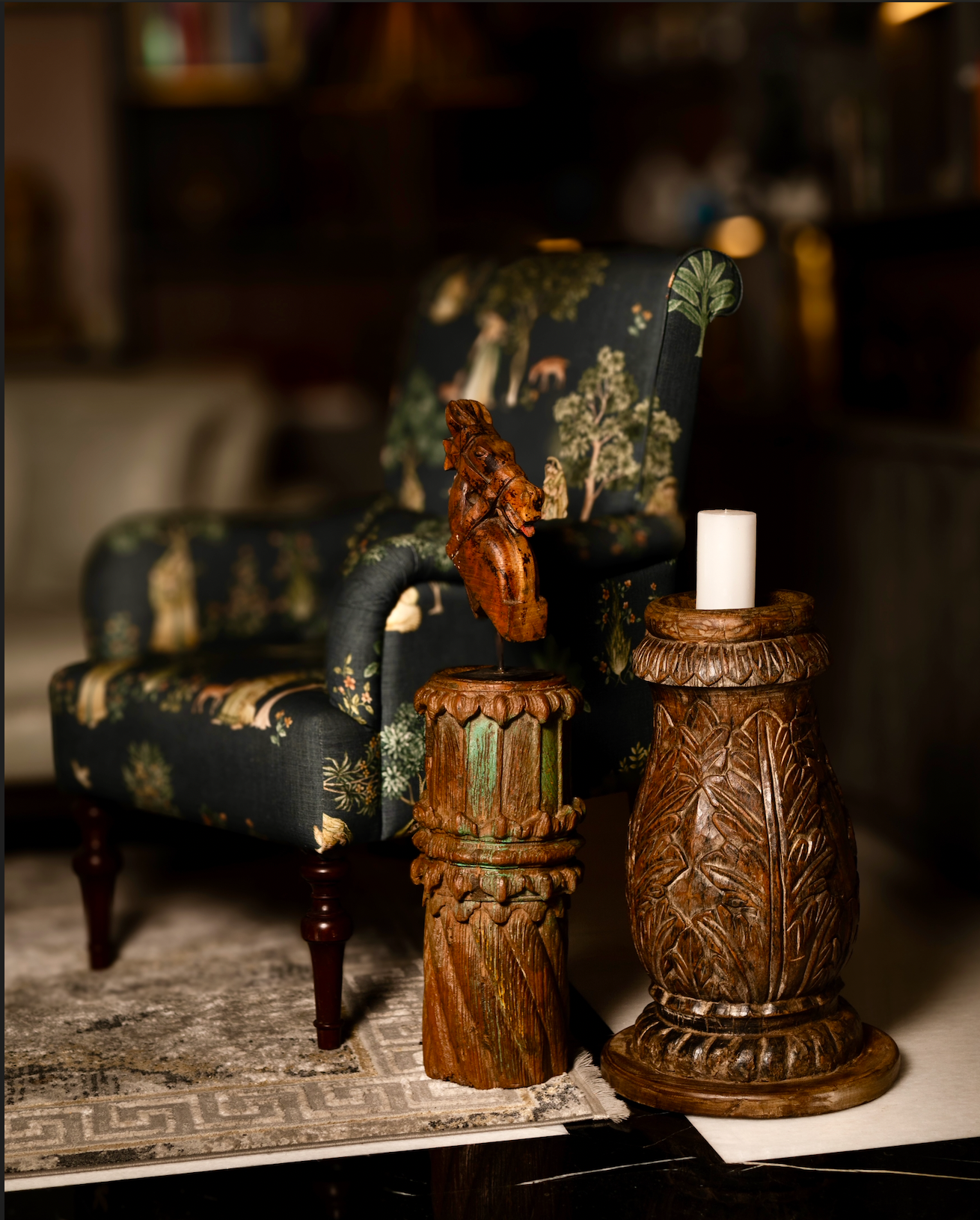 The Dumro Stambh is a salvaged wooden fragment reimagined into a sculptural accent. With its rounded drum-like form inspired by the traditional dumro, vertical fluting, and natural plant-based green patina.