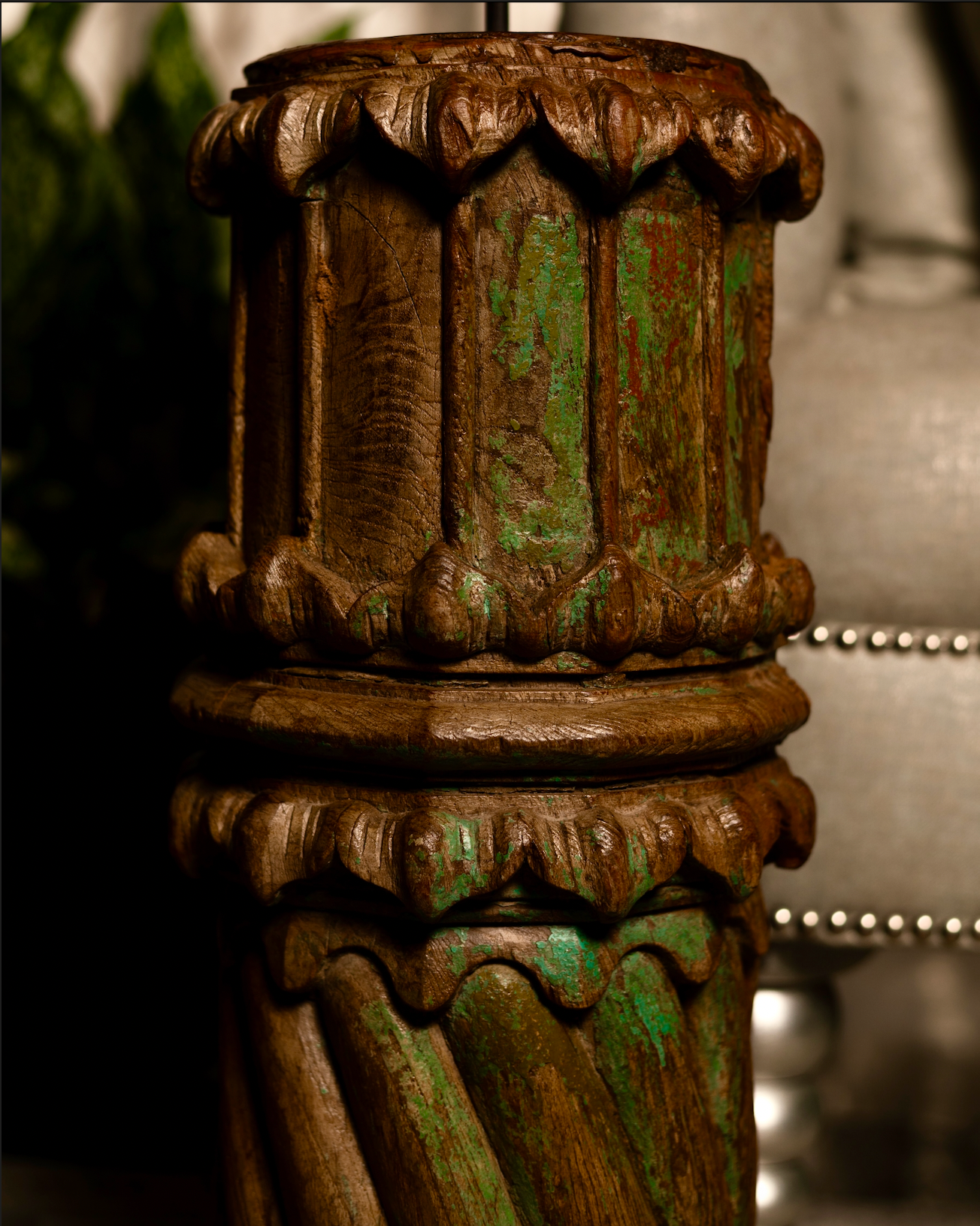 The Dumro Stambh is a salvaged wooden fragment reimagined into a sculptural accent. With its rounded drum-like form inspired by the traditional dumro, vertical fluting, and natural plant-based green patina.