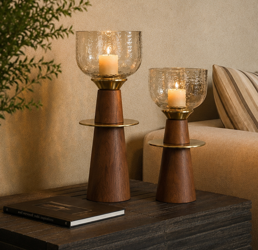 A pair of tapered wooden candle stands crowned with hand-textured glass bowls that catch and scatter candlelight beautifully. 