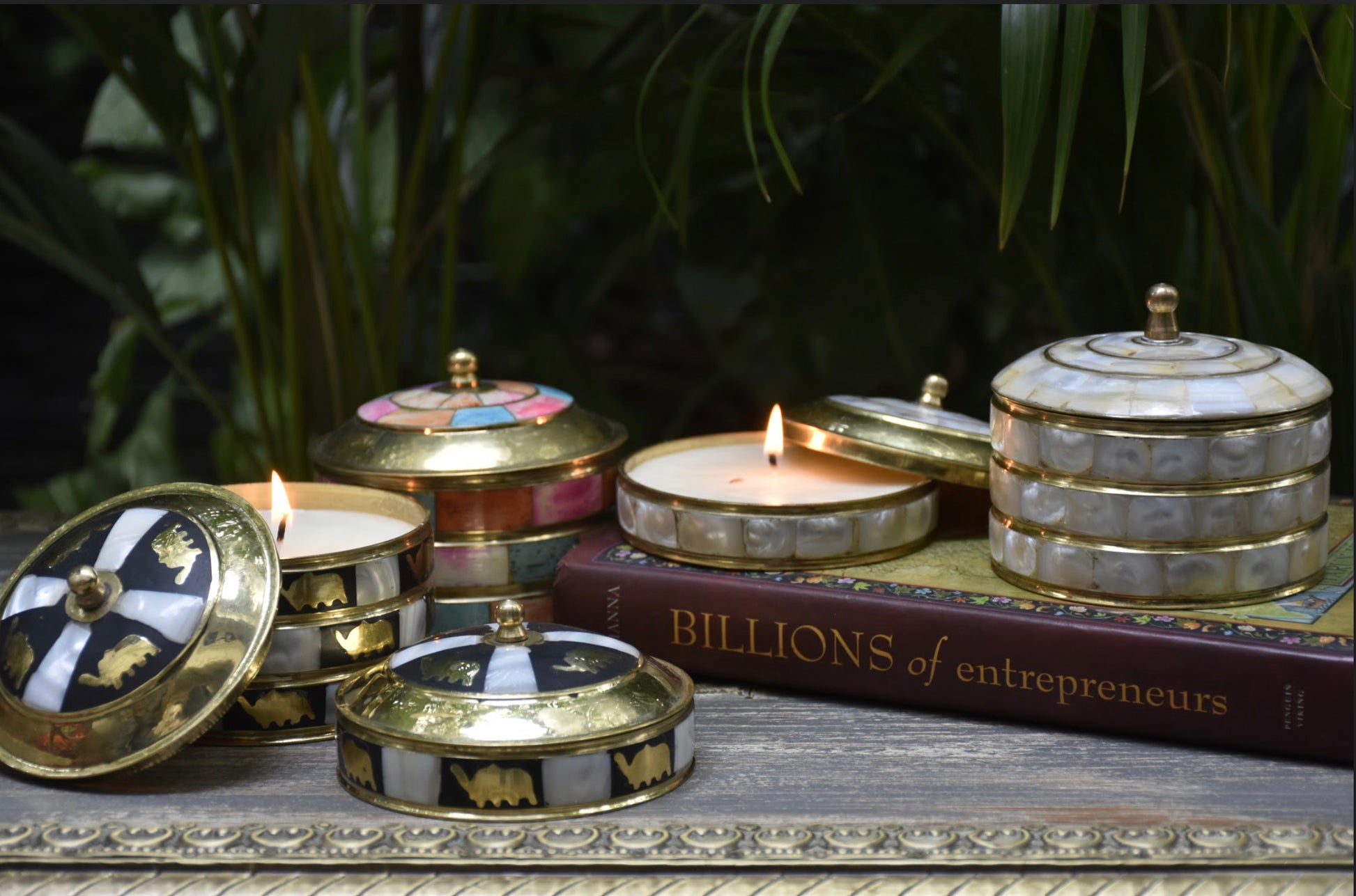 Scented Candles, Made with SoyBean Wax in a Brass container with and Mother of Pearl. These come in SIX different Frangrances.
