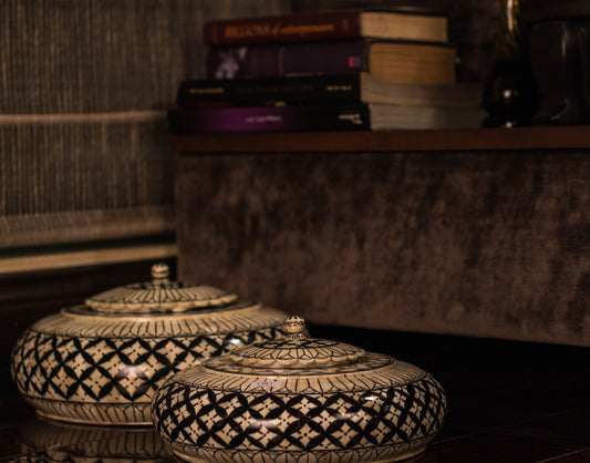 A black & white Camelbone decorative accessory pot.