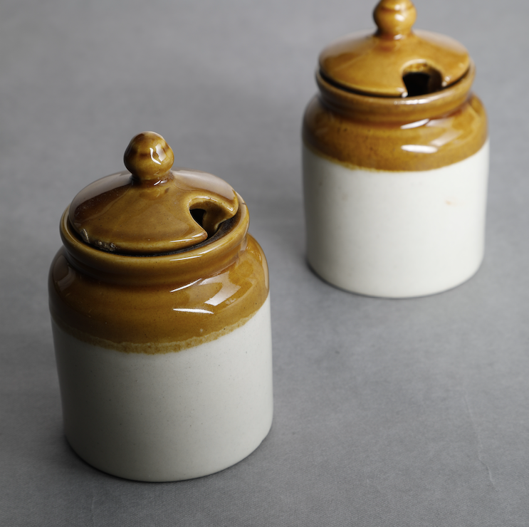 These Handmade, Earthy yet useful ceramic jars are a pretty addition to your kitchen decor or your dining table.