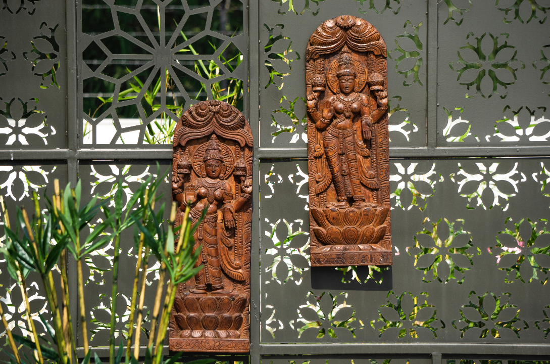 A Mango wood plack engraved with traditional diety cardving inspired by the South Indian Carving Culture