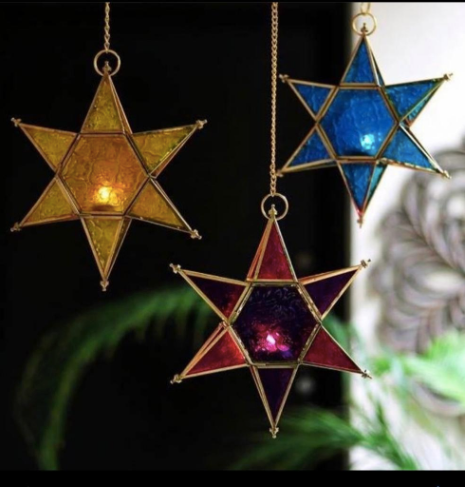 These colourful starlight tea light holders are made of lacquered brass and glass. Come in yellow, pink & blue.