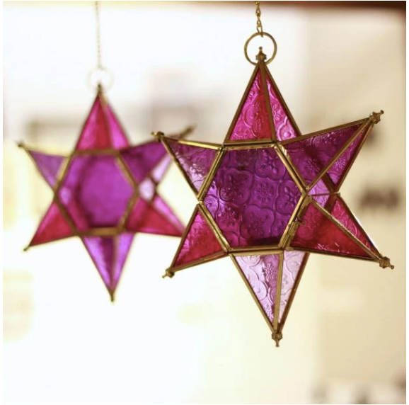 These colourful starlight tea light holders are made of lacquered brass and glass. Come in yellow, pink & blue.