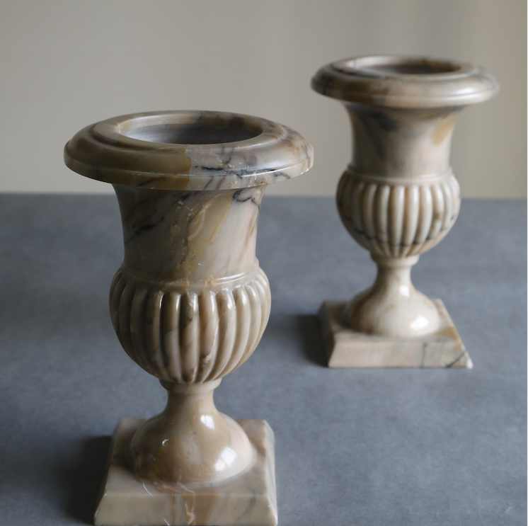 Hand Carved marble chalice glass decoratives with a stand at the bottom.