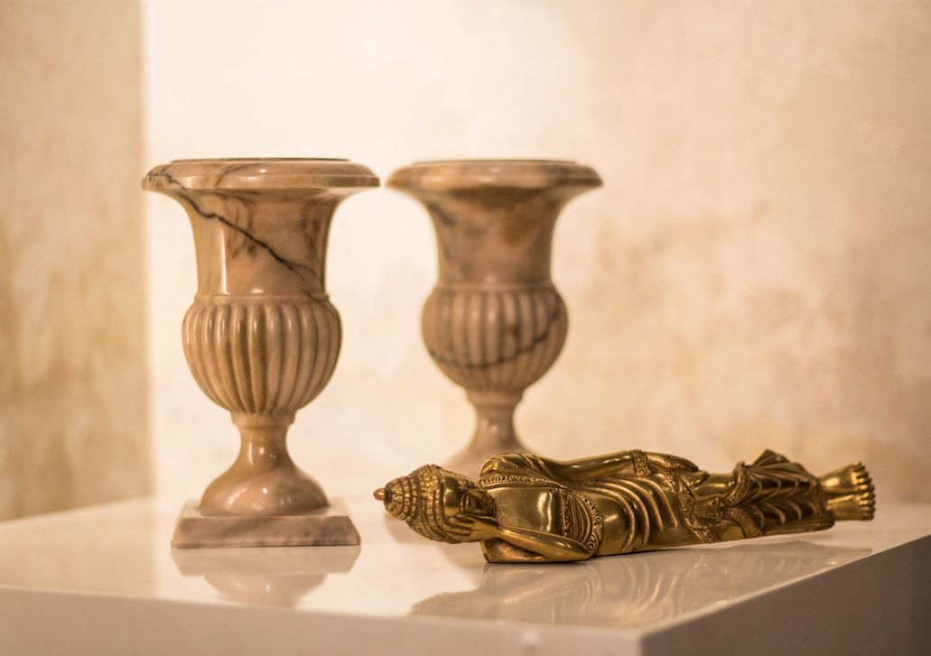 Hand Carved marble chalice glass decoratives with a stand at the bottom.