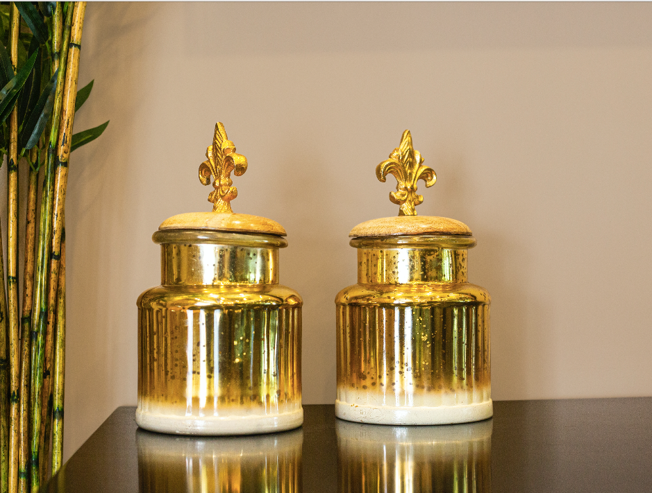 A Pair of two gold glass jars with covered with metal lids, with an ombre gold & white spotted finish.