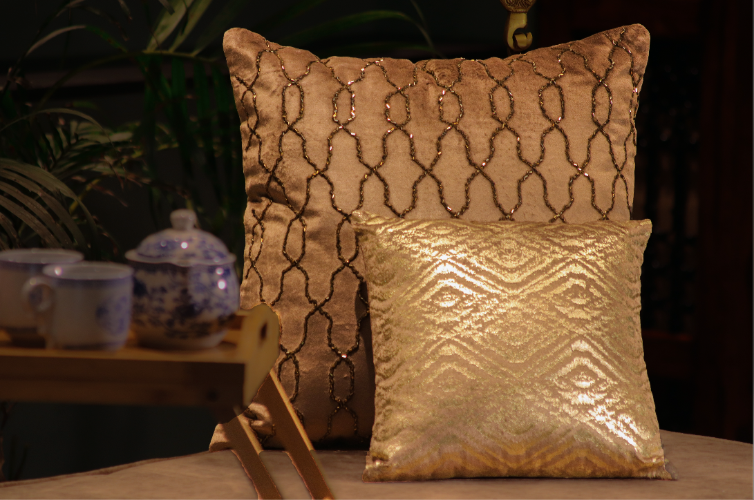 This Pale Brown Beaded Beauty is hand-beaded on Velvet in A Beautiful Interlocking pattern, giving the cushion an elegant & glamorous appeal.