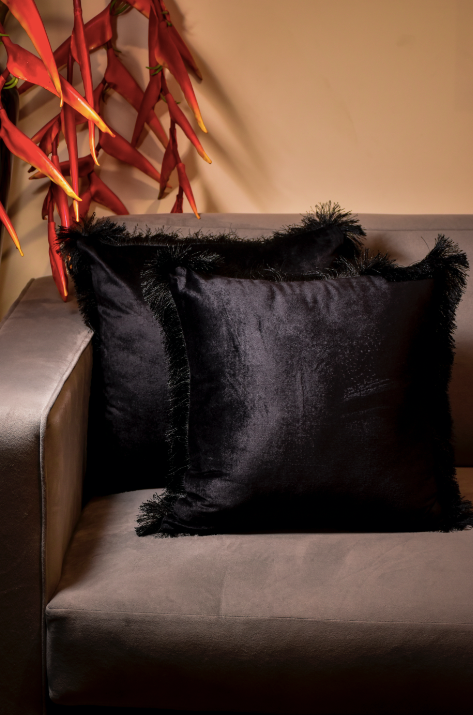 A Black Cushion, inspired by night, made with Cotton Velvet, Surrounded by a furry border, the shadow cushion is a must have and goes with any interior style. 45 x 45 cm