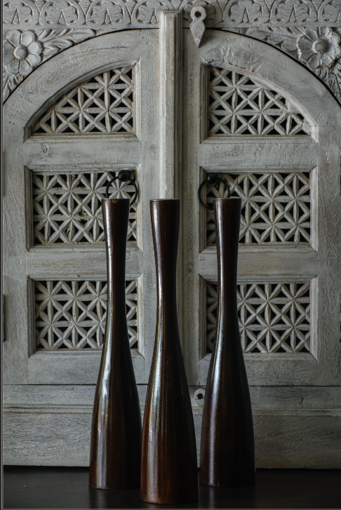 These Beacon Candle Stands are a dream for any home! A rich chocolate brown that compliments any supporting accessories. They are lacquer protected and handmade out of mango tree wood, looks best with candle sticks!