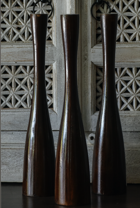 These Beacon Candle Stands are a dream for any home! A rich chocolate brown that compliments any supporting accessories. They are lacquer protected and handmade out of mango tree wood, looks best with candle sticks!