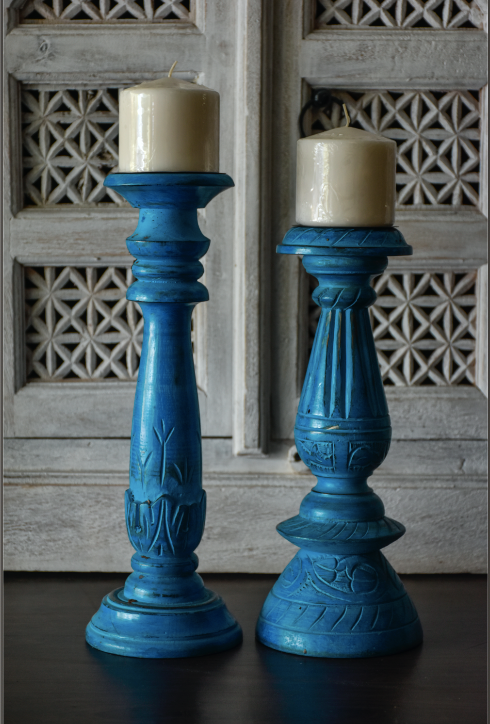This eye catching Wooden Teal Candle Stands sure do make a statement. Complimenting Hand Carved designs make them a unique pair too! Handmade out of mango tree wood. 