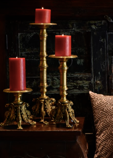 Brass Candle Stands are made of 100% Brass With Jaguar Heads carved onto a brass canvas along with other beautiful details, executed elegantly, supported by three brass legs.