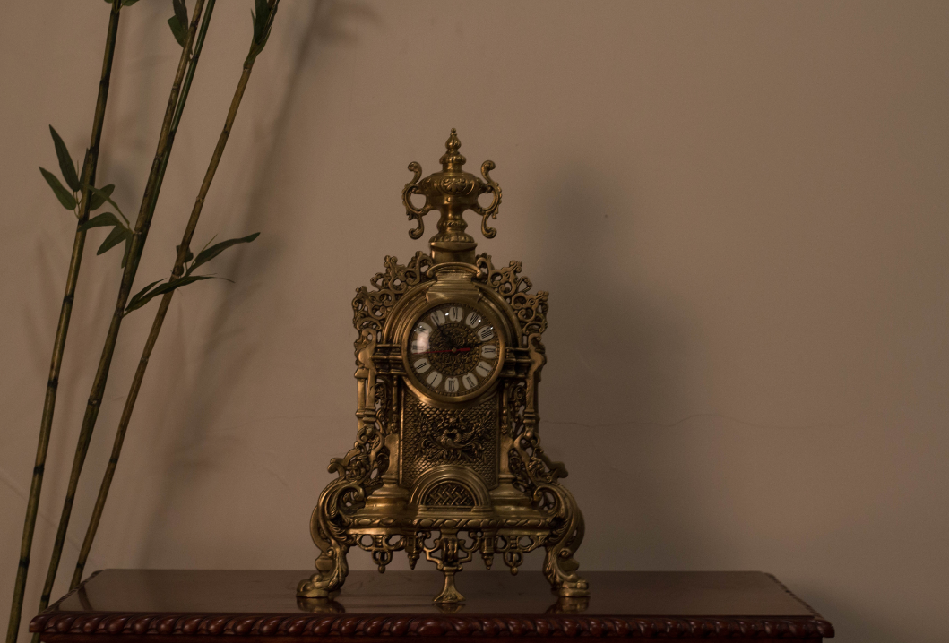  A 100% Brass Clock, carved with intricate beautiful carvings, in an antique finish, supported by Five Legs(5) to give it support. 