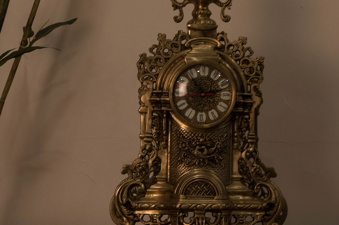  A 100% Brass Clock, carved with intricate beautiful carvings, in an antique finish, supported by Five Legs(5) to give it support. 