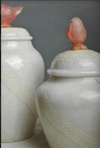 Made with white marble, the textured wave details, wrapped across both the pots along with the semi-precious bird detail on the top lid handle.