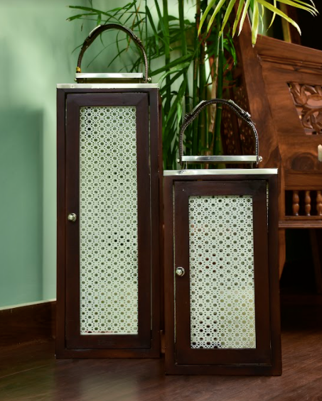 Wooden lanterns are made of mango wood wrapped with white jaali's on all four ends of the lanterns.
