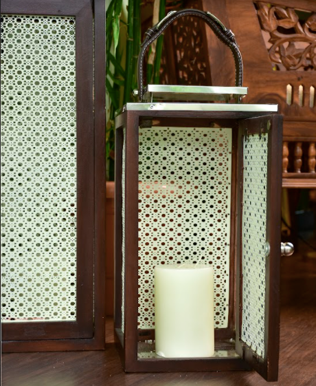 Wooden lanterns are made of mango wood wrapped with white jaali's on all four ends of the lanterns.