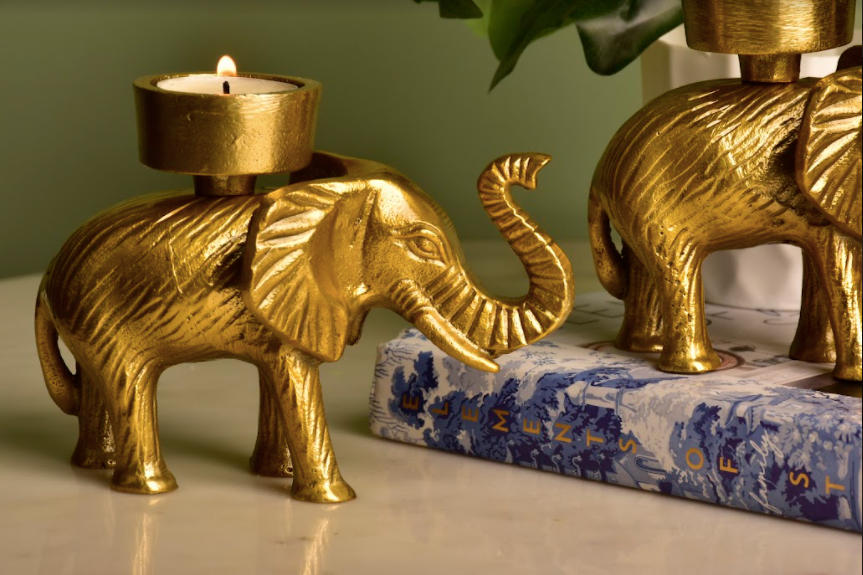 Small Tea Light Candle Holders Made With Brass In An Elephant's Image.