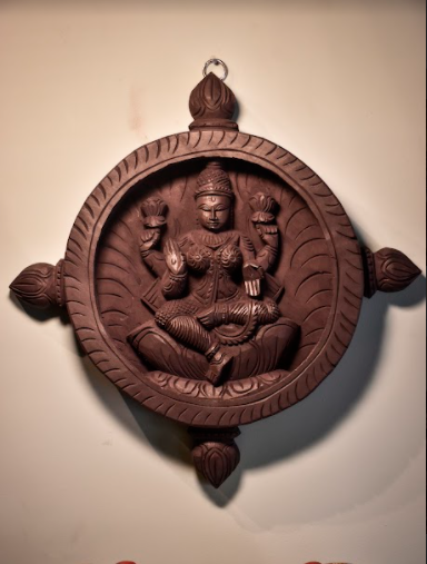Wooden Wall Decorating Wheels Made in Mango Wood Depicting Goddess Laxmi & Saraswati