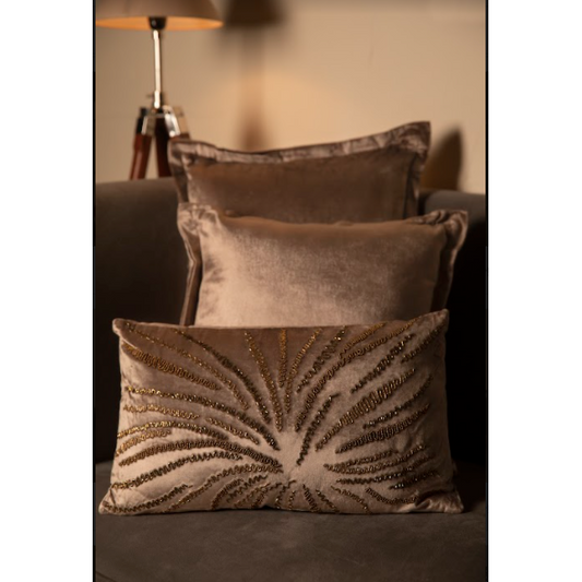 With a Sultry Grey, The Cushion has hand sewn gold details running throughout the cushion