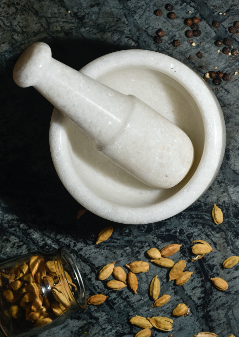 Made Of Marble, This Marble & Pestle Set is perfect to grind those spices.