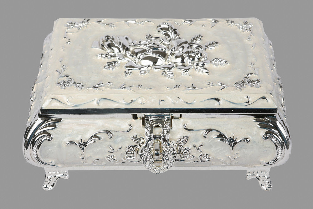 A silver box with carvings, perfect for gifting purposes or for storing  of refreshments.