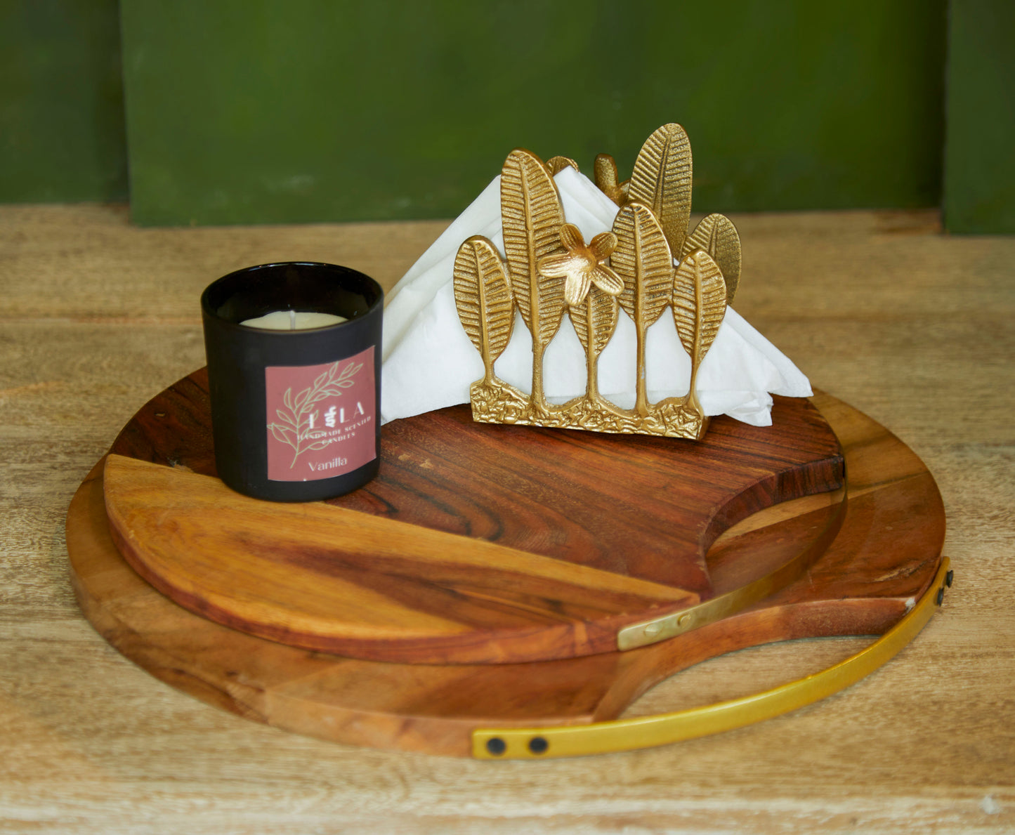 A Round Wooden Platter With A Metal Handle On One Side.